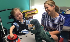 Andrew and his mom play with a switch toy