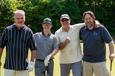 a foursome of golfers