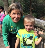 lekotek leader and child play at rice table