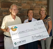 helene prokesch receives check from sawnee emc